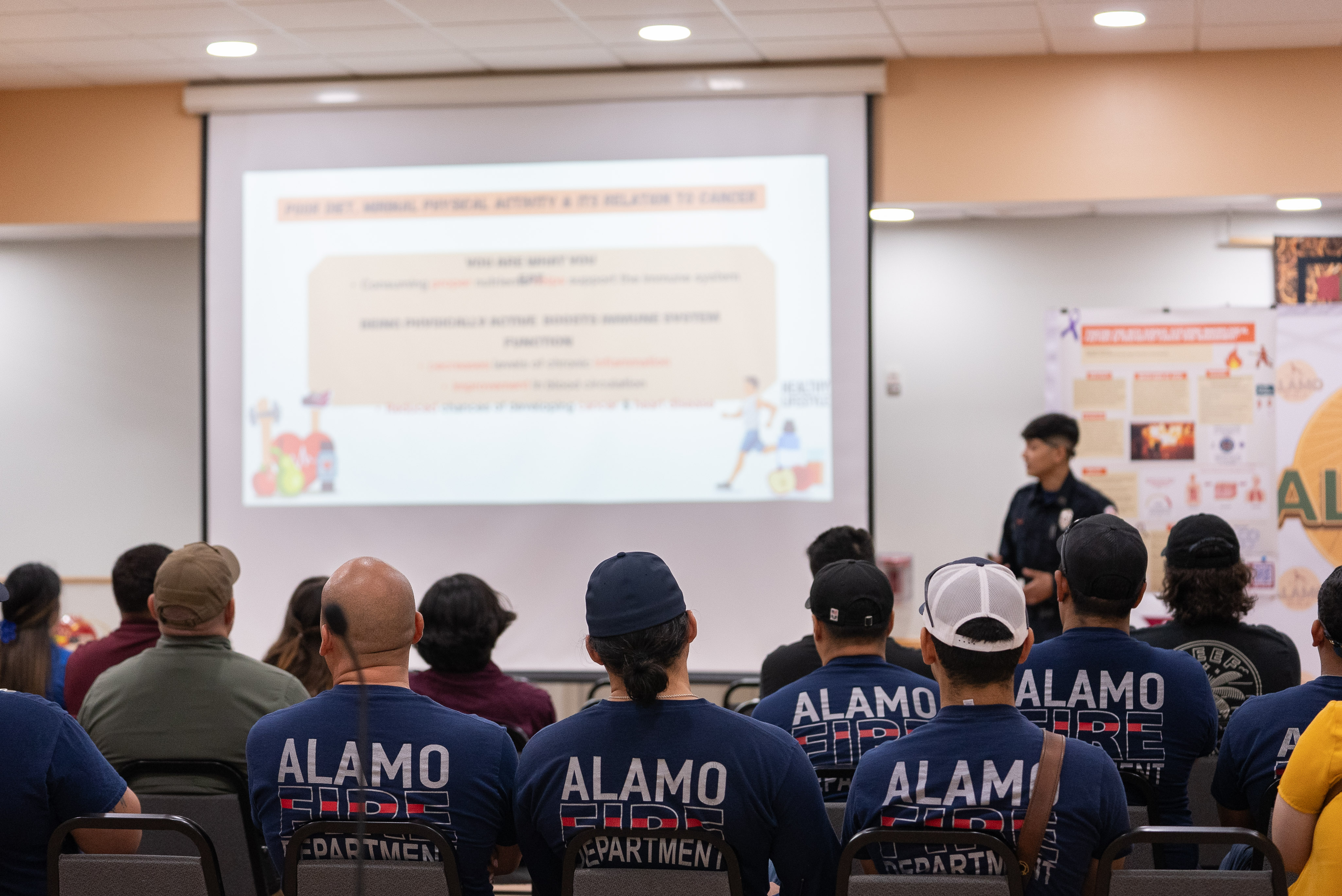 Andy Garza presents at Alamo City Hall.
